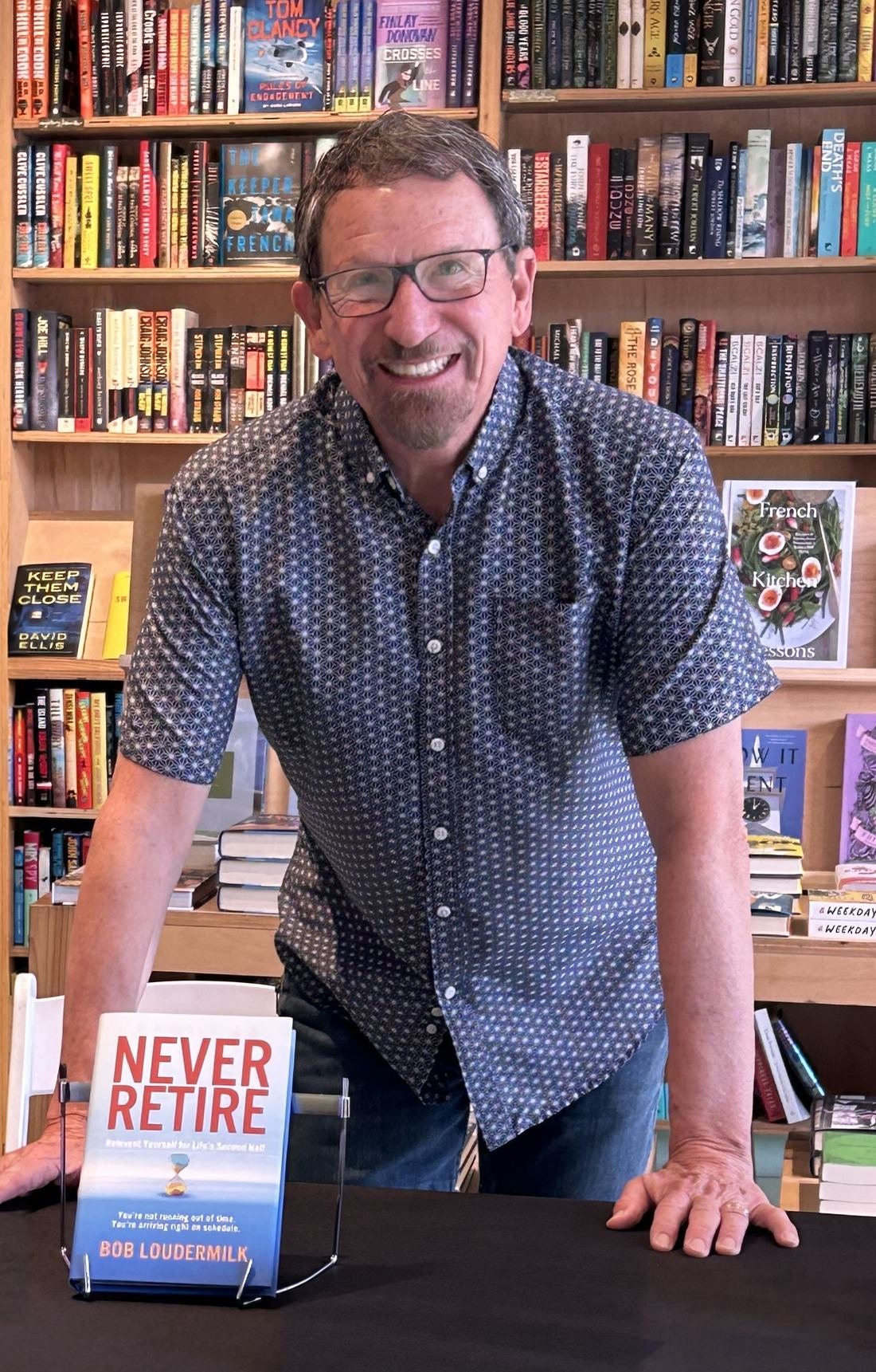 Bob Loudermilk with his book Never Retire
